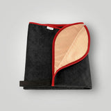 Black and red waterproof car seat towel folded