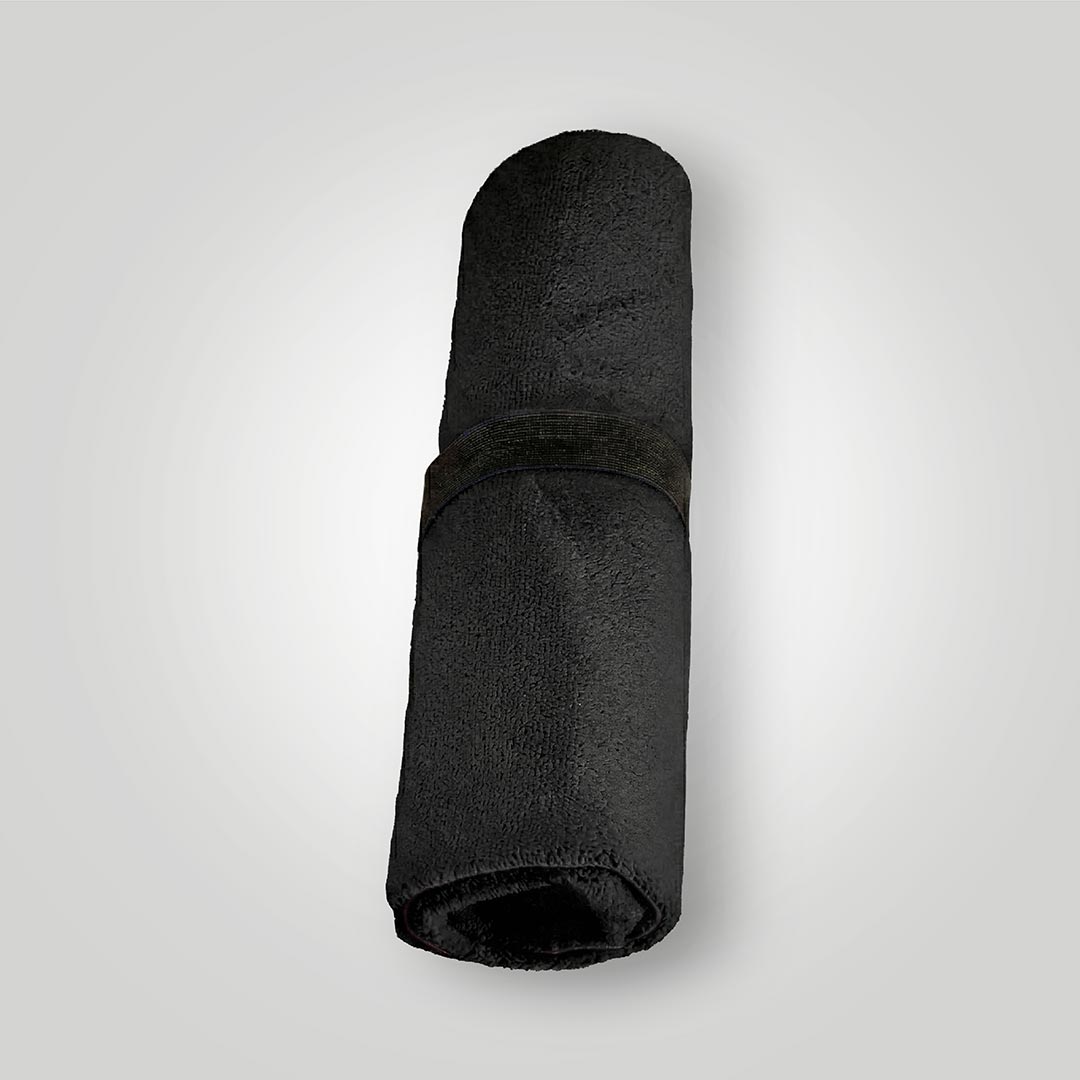 Black and red waterproof car seat towel rolled up