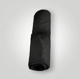 Black and red waterproof car seat towel rolled up