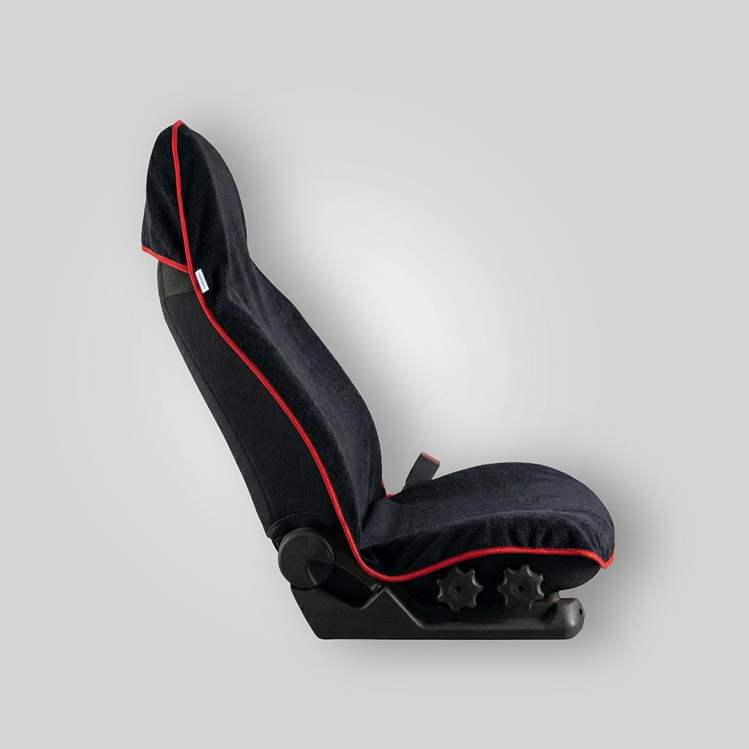Black and red waterproof car seat towel side view fitted over a front car seat