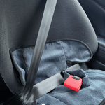 Waterproof child seat towel in charcoal grey placed in a car seat with seatbelt secured.