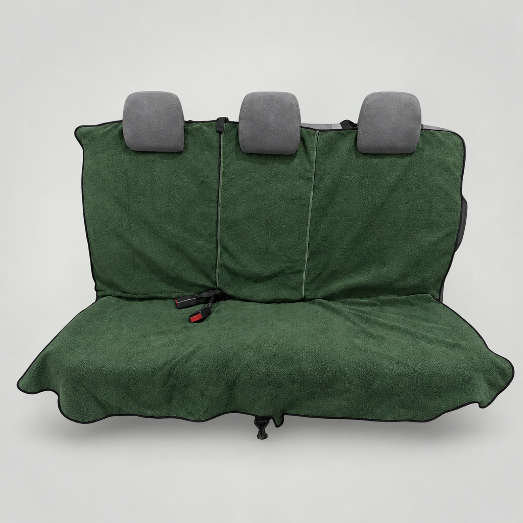 Moss Green waterproof back seat towel fitted across a rear bench seat on a light grey studio background