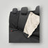 Black rear car seat cover with beige interior on a grey background